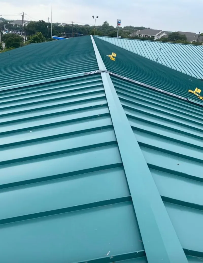 Green commercial metal roof ridge and valley for Metal Roof Repair in Whitestown